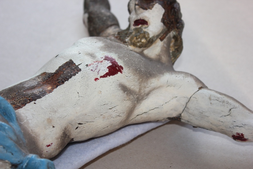 Une image contenant mammifère, statue, pose, allongé

Description générée automatiquement